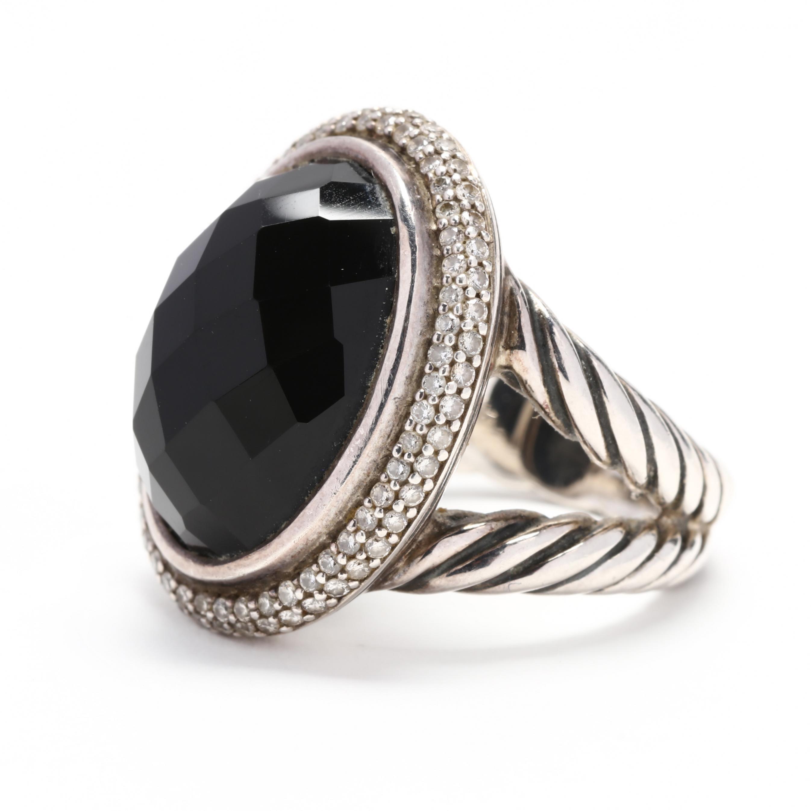 Sterling silver, black onyx and diamond ring