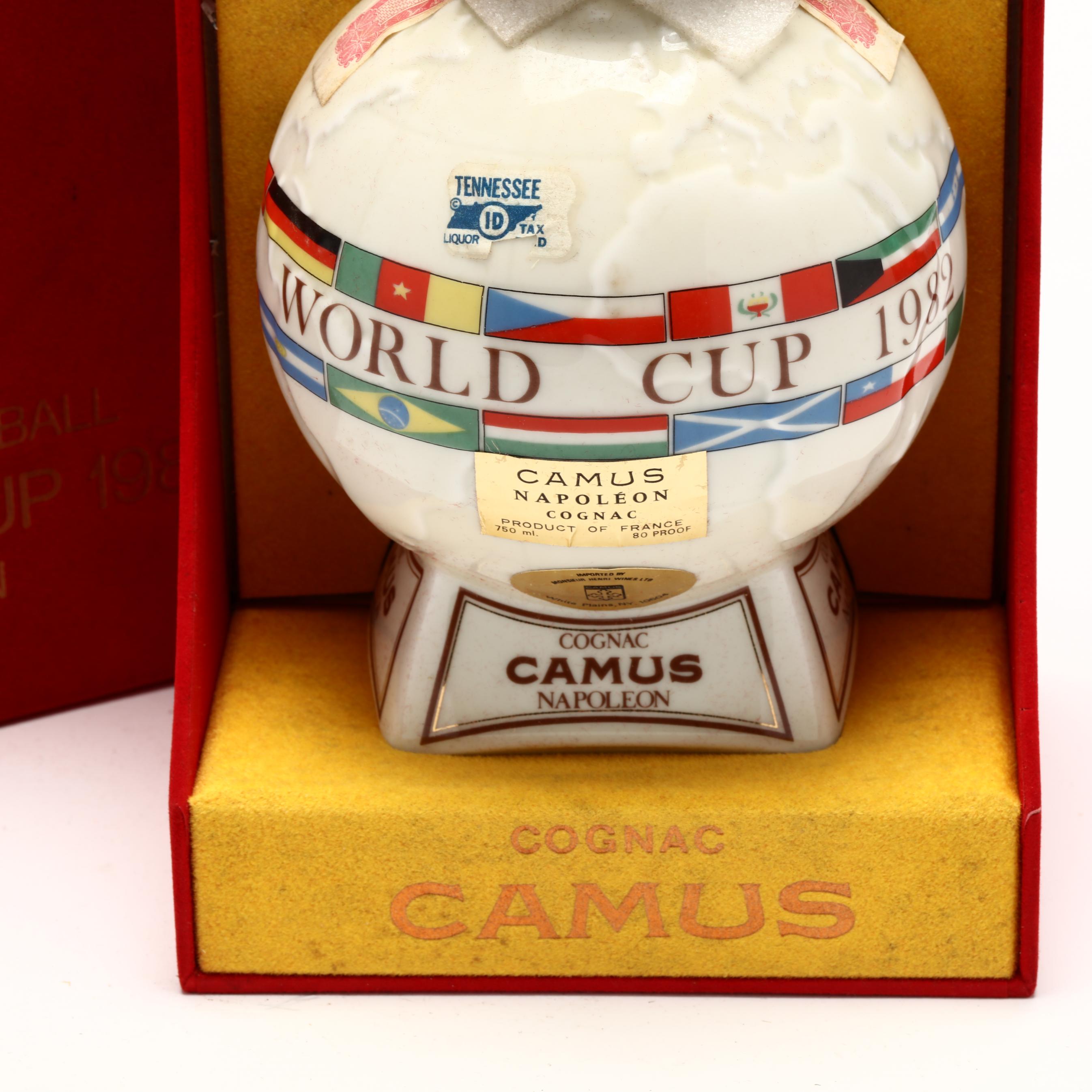 Camus Napoleon Cognac in 1982 World Cup Porcelain Decanter (Lot 