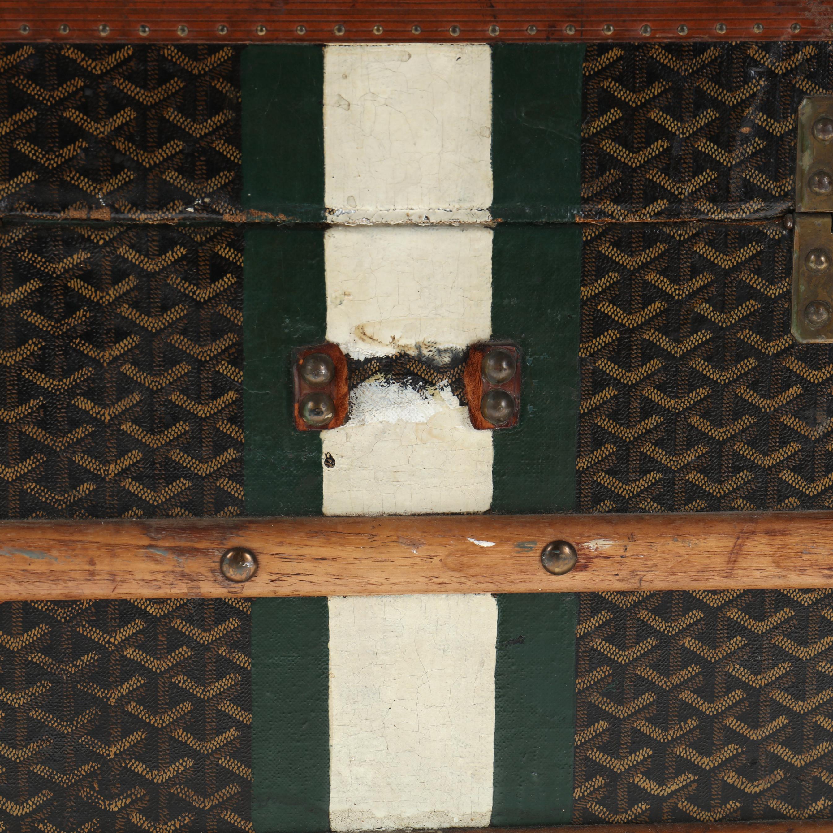 Leather Goyard steamer trunk with key