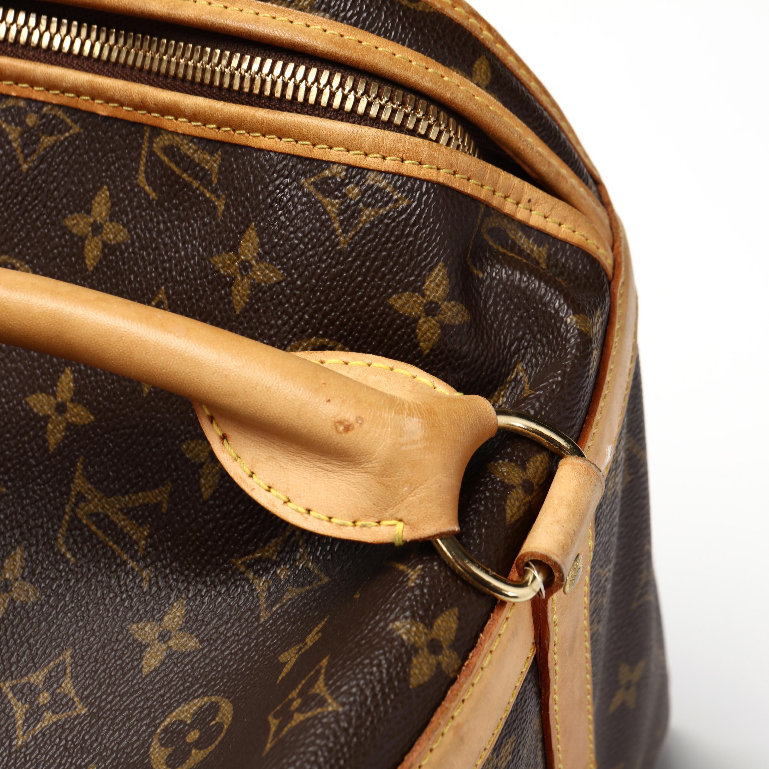 At Auction: LOUIS VUITTON MONOGRAMMED ALIZE 2 TRAVEL BAG