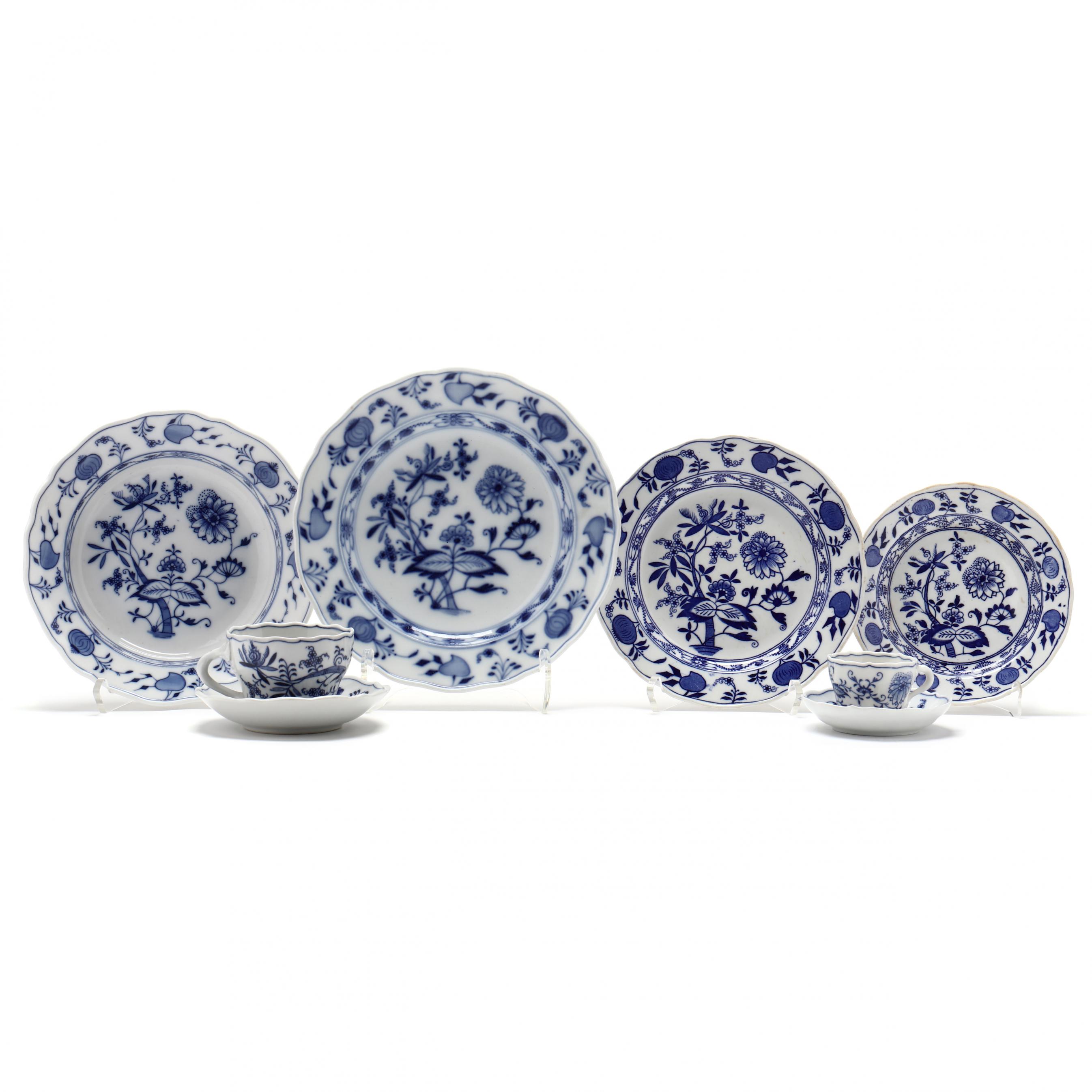 Sold at Auction: A pair of blue and white porcelain covered soup