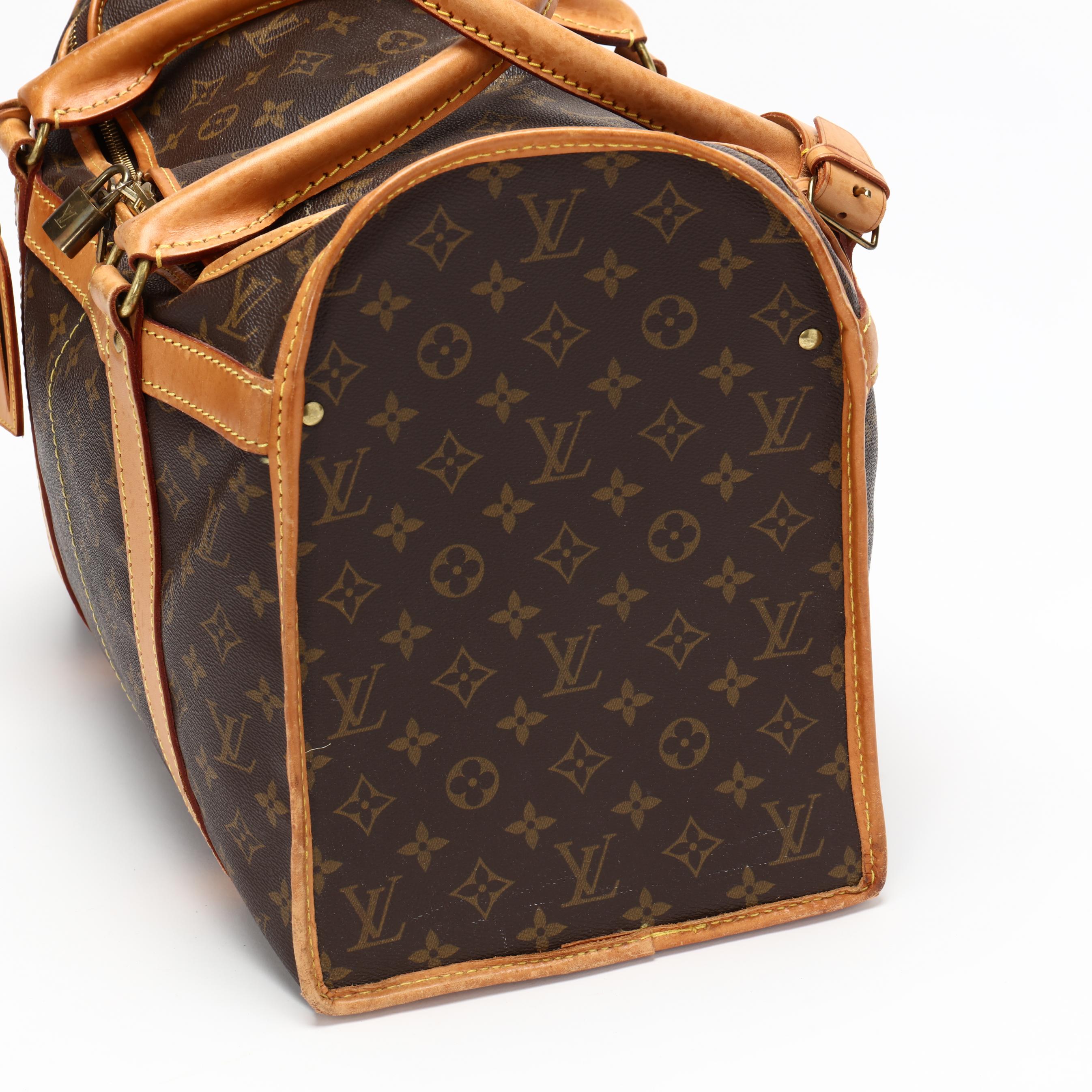 At Auction: Louis Vuitton, Louis Vuitton Sac Souple Travel Bag