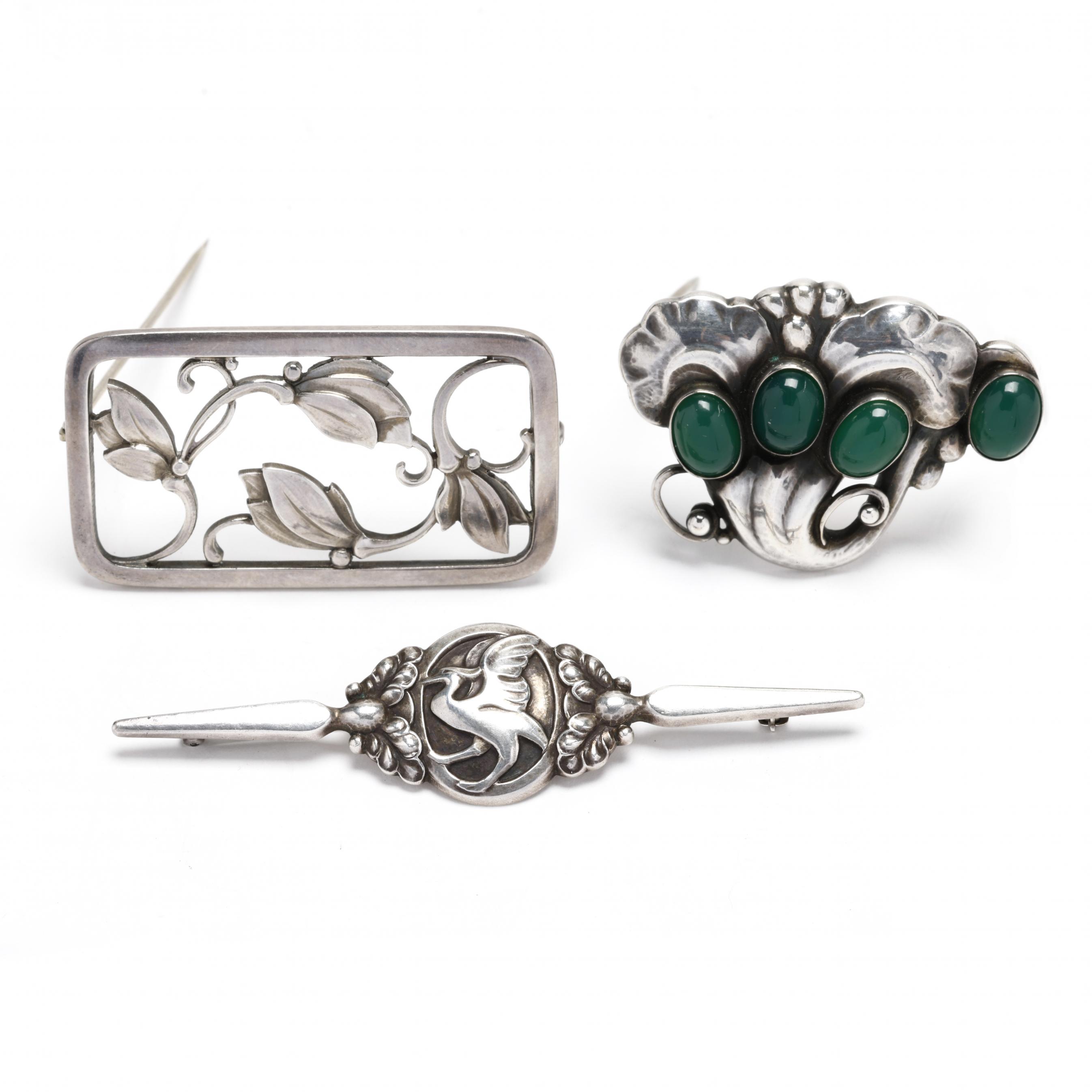 Three Sterling Silver Brooches and a Sterling Silver and Gem-Set ...