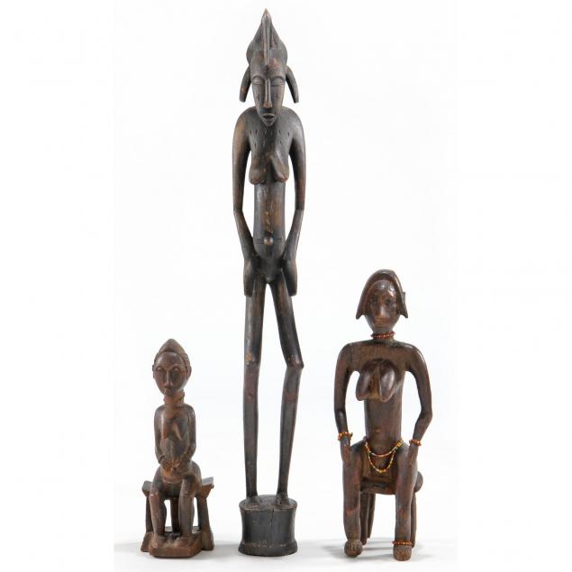 three-african-carved-wooden-female-figures