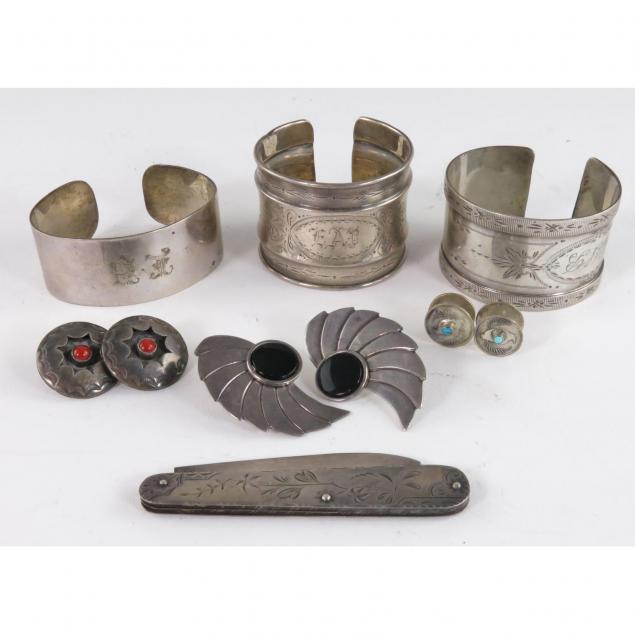 group-of-silver-jewelry-and-accessories