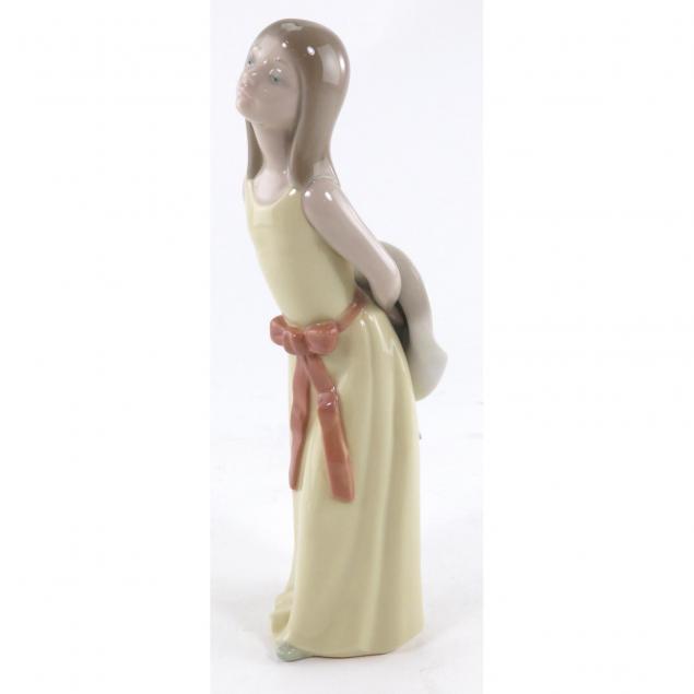 Lot 152 - Two Lladro figures, two Nao figures and a