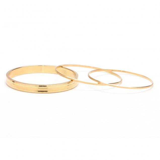 three-18kt-gold-bangle-bracelets-sixtar