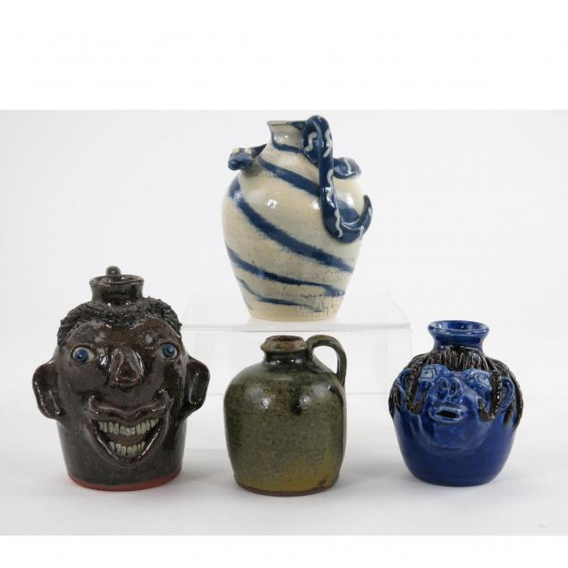 four-pottery-jugs
