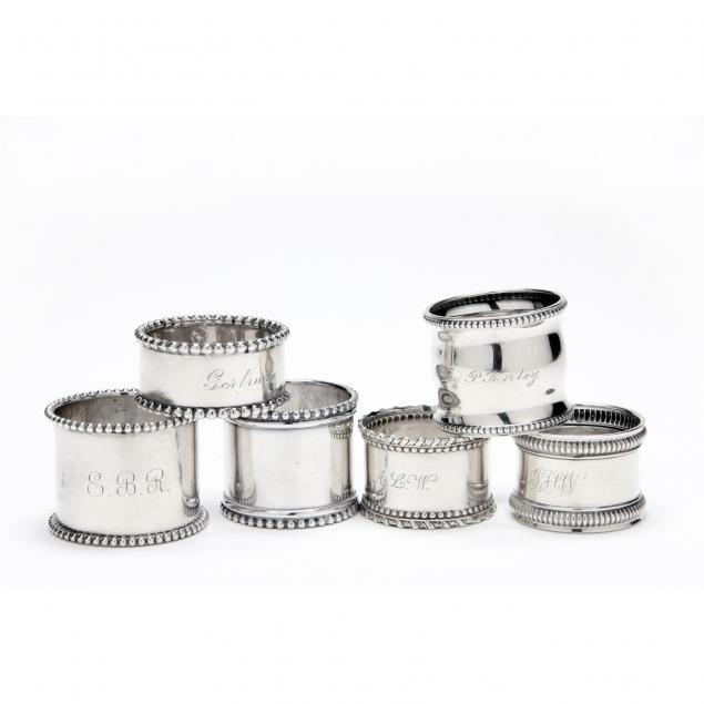 an-assembled-set-of-six-silver-napkin-rings