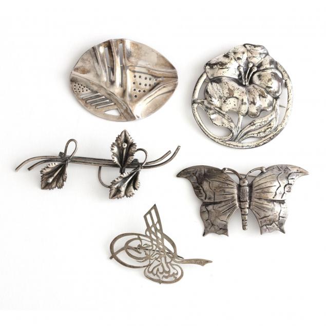 five-silver-brooches