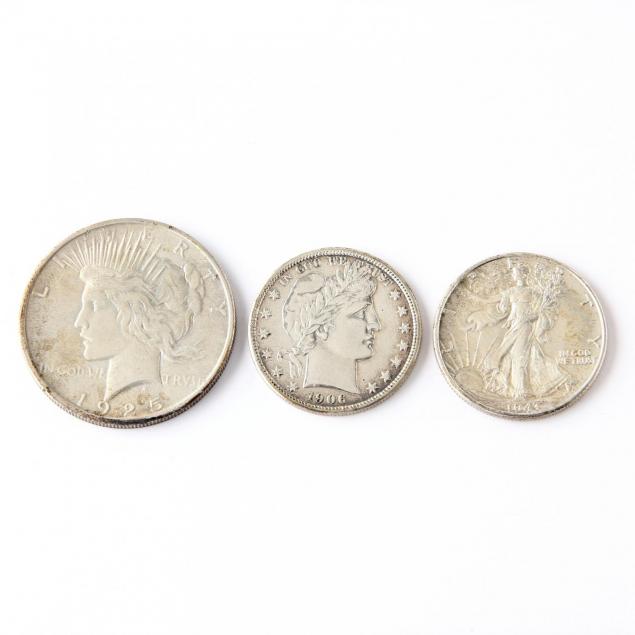 a-high-grade-1925-peace-dollar-and-two-silver-halves