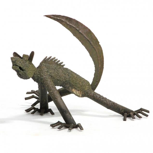 industrial-metal-outdoor-sculpture-of-a-gremlin