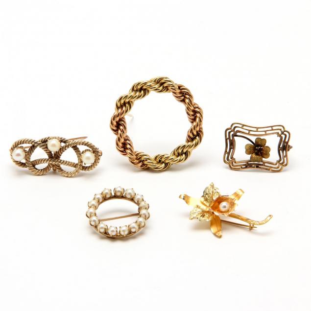 four-gold-brooches-and-one-gold-filled-brooch