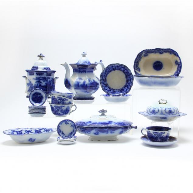 approximately-40-pieces-of-antique-flow-blue-table-accessories