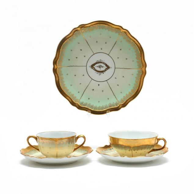 an-antique-egyptian-revival-porcelain-luncheon-set