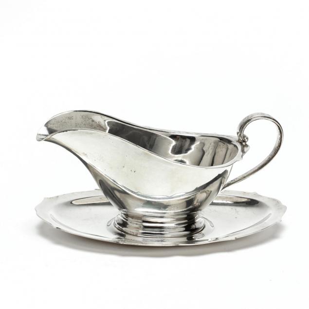 a-sterling-silver-sauce-boat-and-underplate