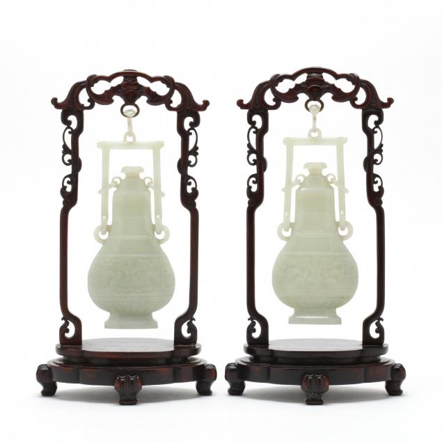 a-pair-of-pale-celadon-jade-hanging-vases-with-covers
