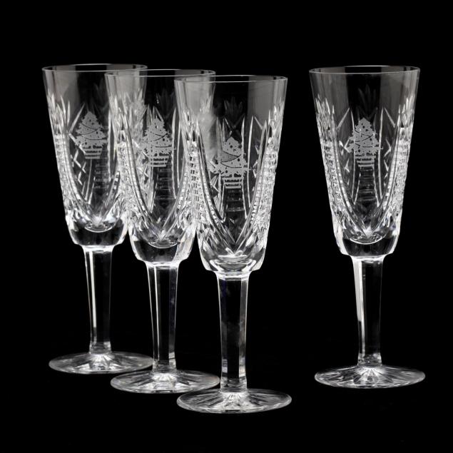 a-set-of-four-waterford-crystal-toasting-flutes