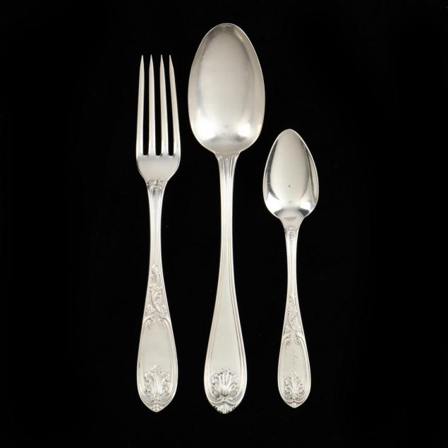 group-of-ornate-coin-silver-flatware