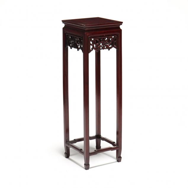 an-asian-hardwood-pedestal-stand