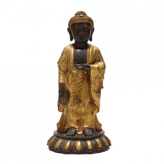 a-standing-bronze-statue-of-a-buddha