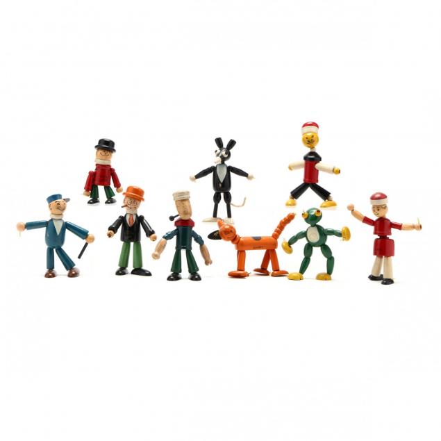 a-group-of-articulated-wooden-toys