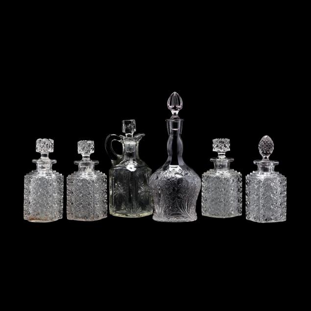 six-antique-pressed-glass-decanters