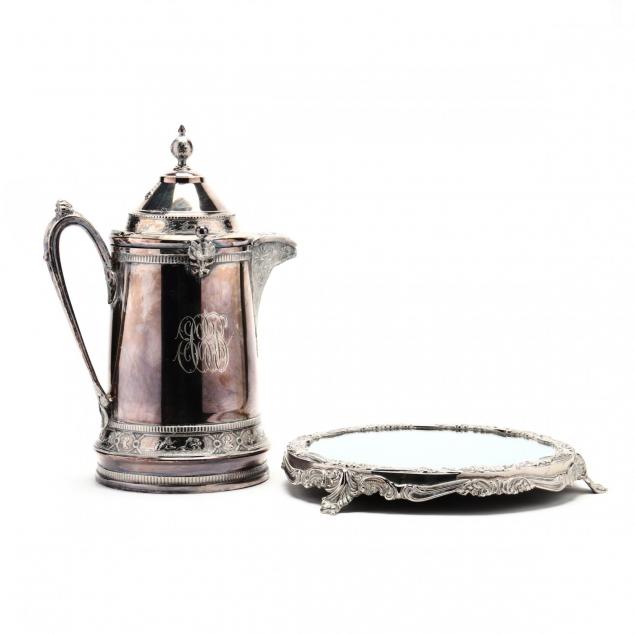 a-silverplate-ice-water-pitcher-and-mirrored-plateau