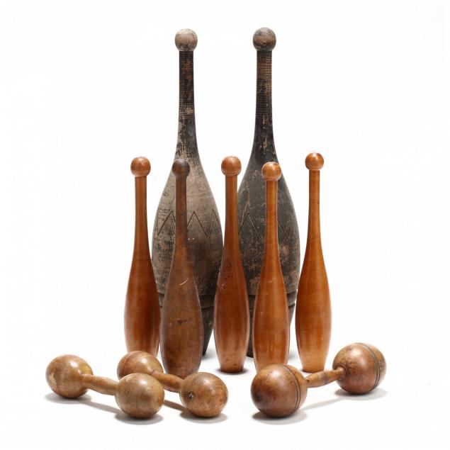 group-of-antique-indian-clubs-and-weights
