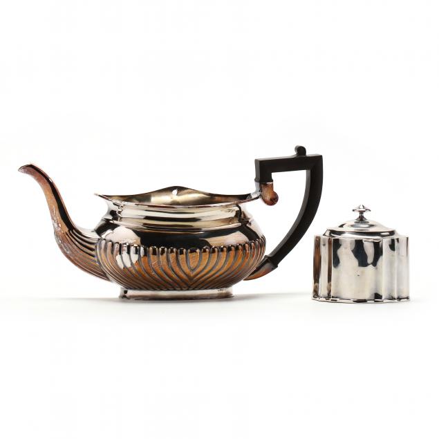 a-sterling-silver-tea-caddy-with-a-silverplate-teapot-wall-pocket