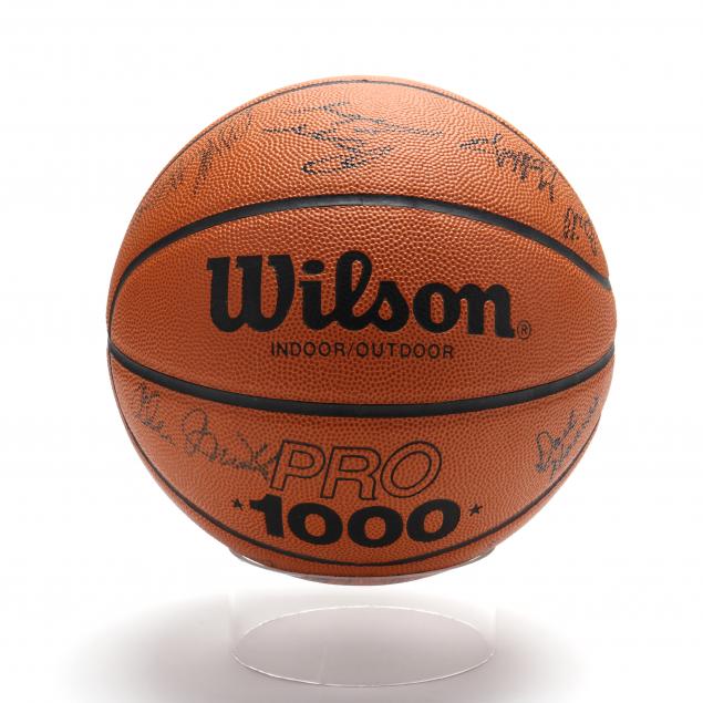 unc-team-signed-basketball-including-shammond-williams-and-ed-geth
