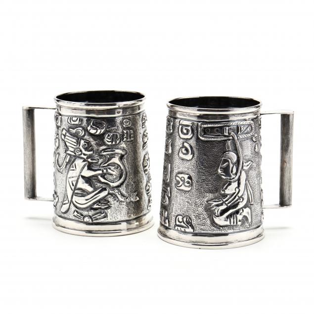 a-pair-of-sterling-silver-tankards-with-aztec-motifs