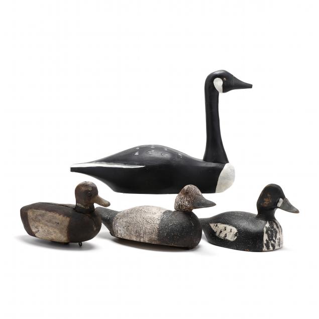 four-carved-and-painted-wood-decoys