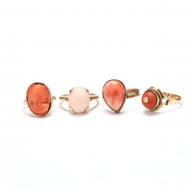 four-gold-and-coral-rings