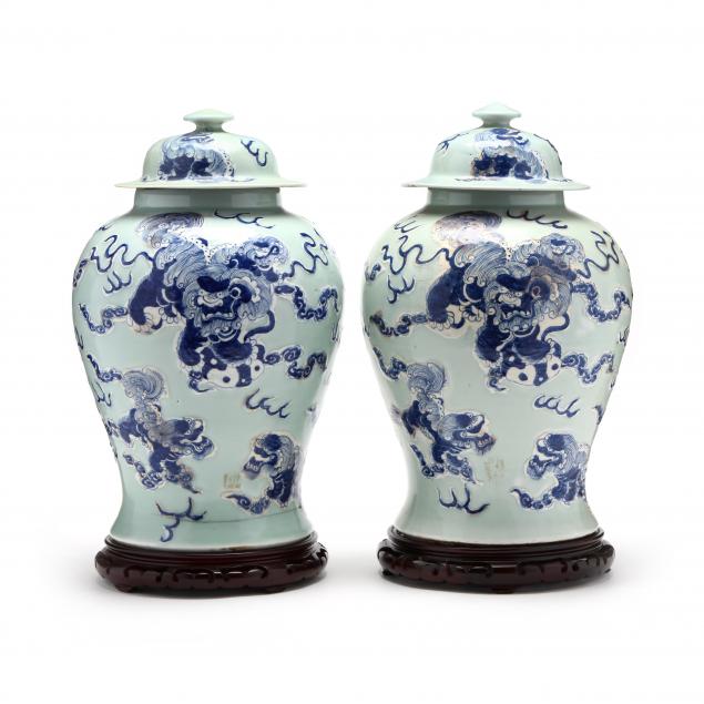 a-pair-of-large-chinese-celadon-covered-jars-with-foo-lions