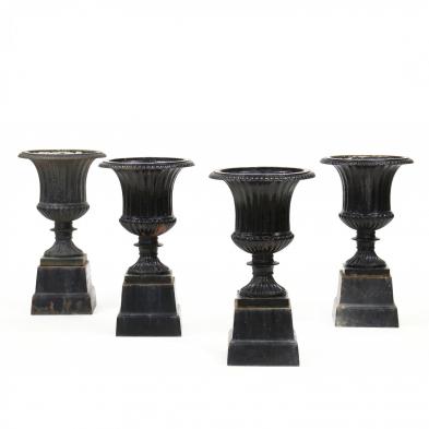 set-of-four-classical-style-cast-iron-garden-urns-on-pedestals