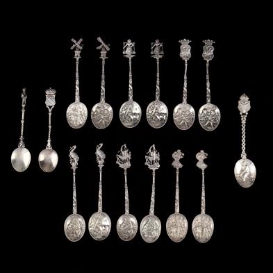 a-collection-of-15-cast-silver-souvenir-spoons