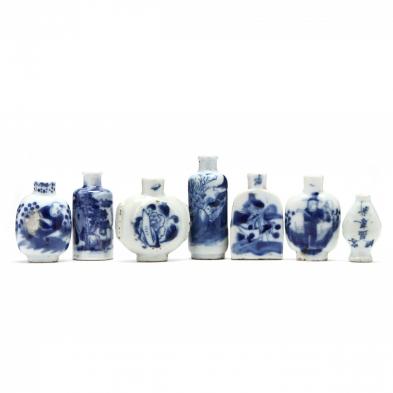 a-group-of-seven-chinese-blue-and-white-porcelain-bottles