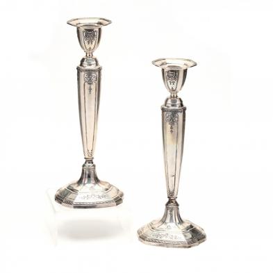 a-pair-of-reed-barton-heritage-sterling-silver-candlesticks