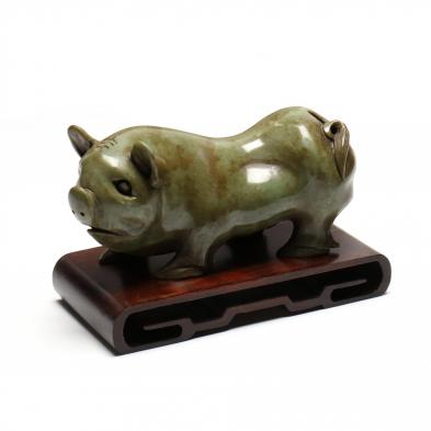 an-asian-hard-stone-pig-with-stand