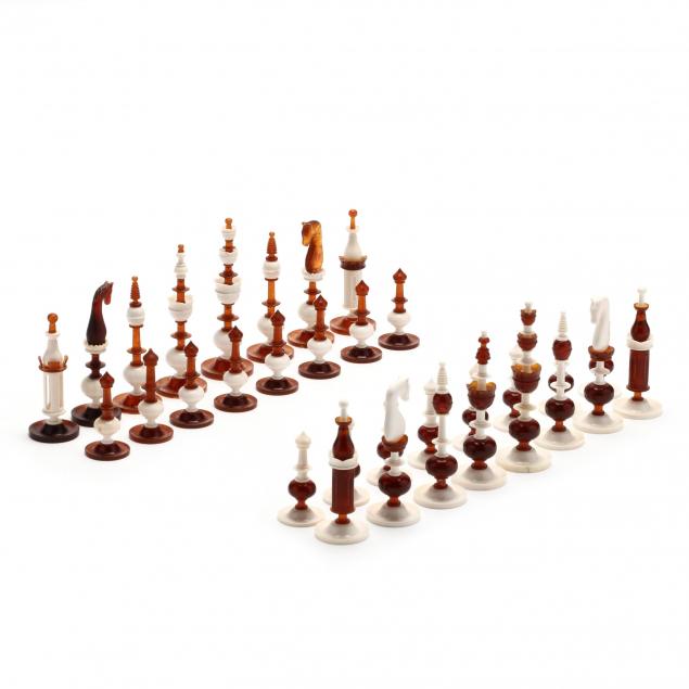 oleg-raikis-russia-20th-century-amber-and-ivory-selenus-style-chess-set