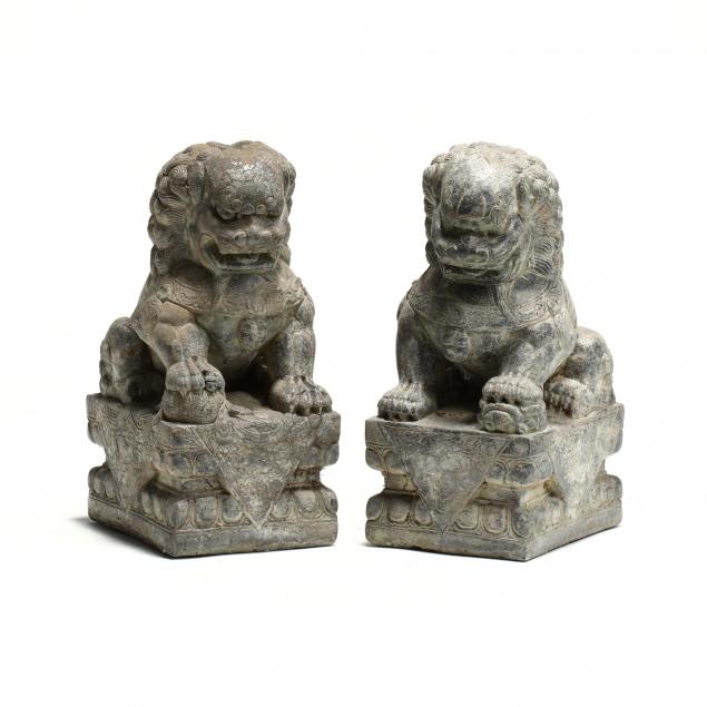 a-pair-of-asian-carved-stone-foo-dogs