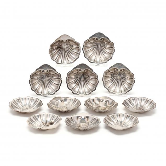 a-set-of-twelve-sterling-silver-shell-form-butter-pats
