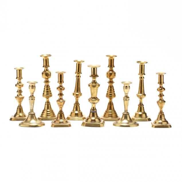 ten-antique-brass-candlesticks