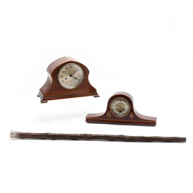 two-vintage-mantel-clocks-and-cane