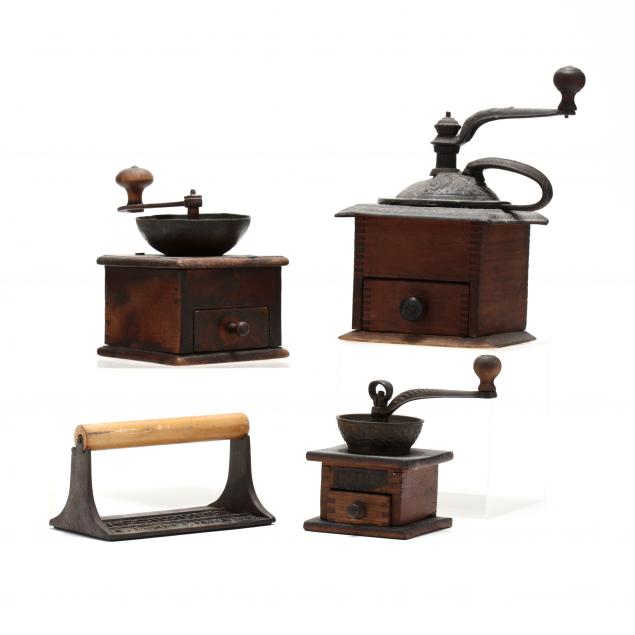 three-antique-coffee-grinders-and-a-bacon-press