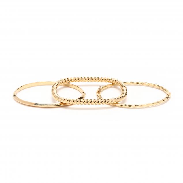 three-18kt-gold-bracelets