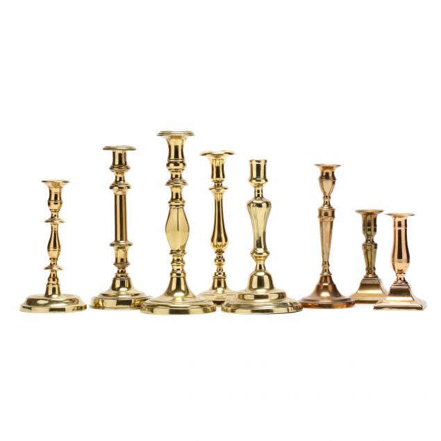 eight-antique-brass-candlesticks