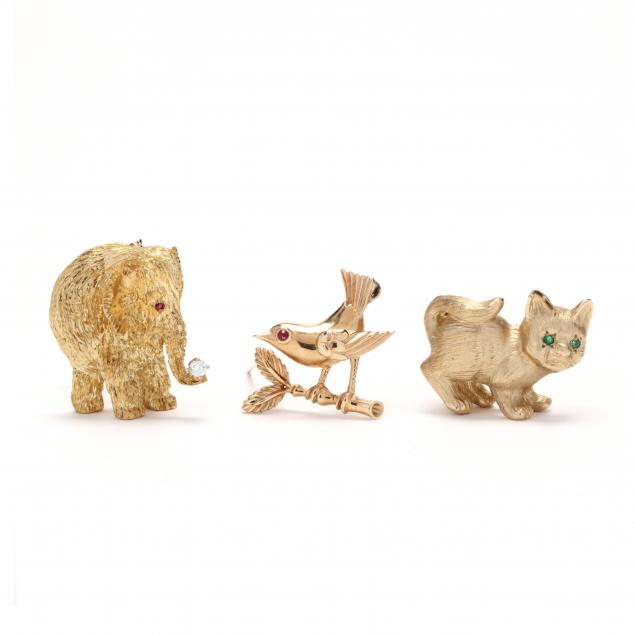 three-whimsical-gold-brooches