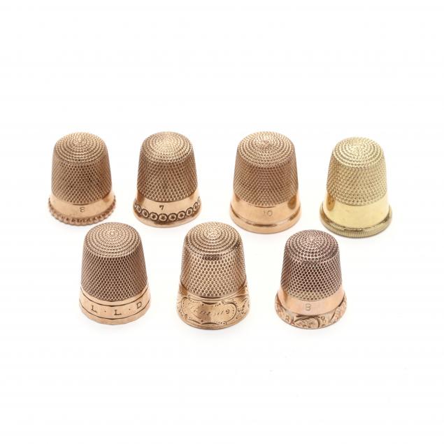 seven-antique-gold-thimbles